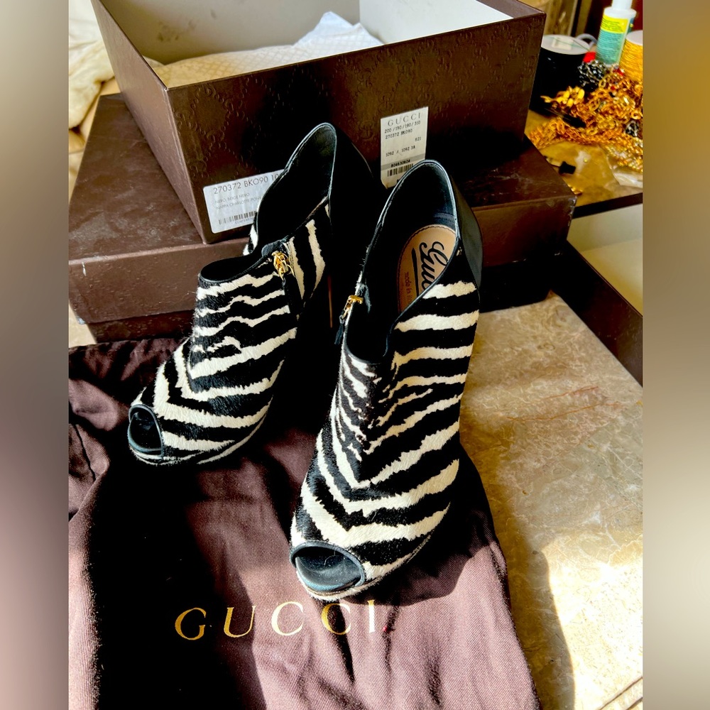 Gucci zebra heels excellent condition paid $1600 sale in for half that $800.